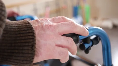 Trembling Older Hands on a Rollator Walker Closeup Stock Footage 125496014
