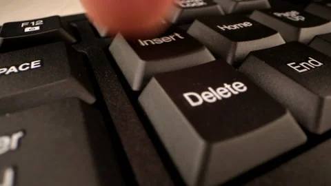 Trembling person hand presses insert button at control keys Stock Footage 148326063