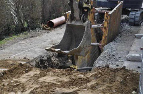 Trench digging in building site Foto stock