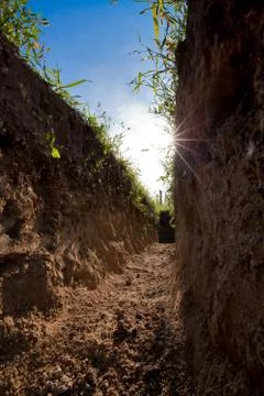 Trench Foto stock