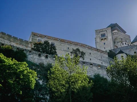 TRENČÍN CASTLE WALLS AND TOWER FROM BELOW – SLOVAKIA, 21 SEPTEMBER 2025 Stock Photos