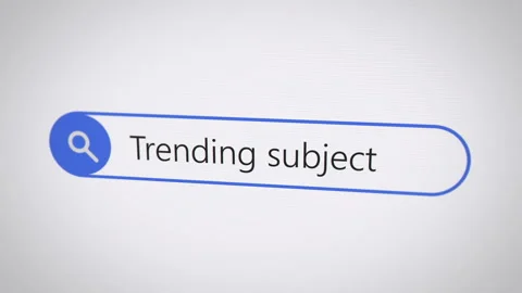 Trending subject search term in browser on computer monitor screen Stockbeeldmateriaal 295942794