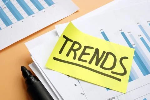 Trends concept. Stack of papers with marketing report. Stock Photos