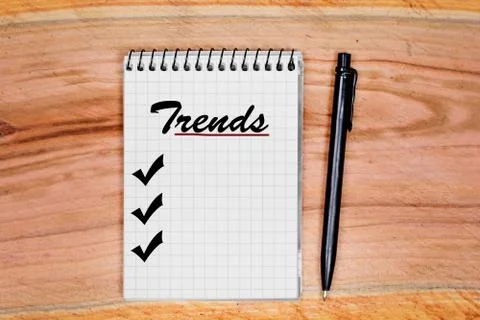 Trends word on notebook Stock Photos