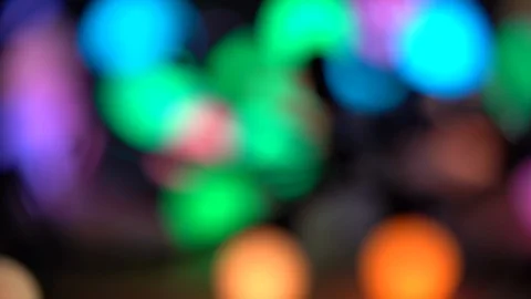 Trendy background abstract colored bokeh circles. Different colors and shapes Stock Footage 105350024