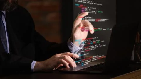 Trendy collage. Professional programmer working with transparent digital display 写真素材