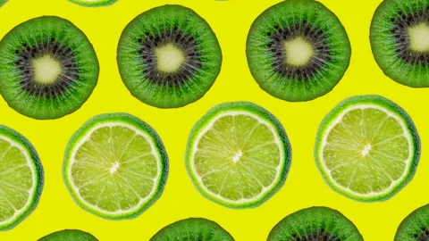 Trendy colorful repeating animation pattern of half of kiwi and lemon or lime on Stock Footage 239716245