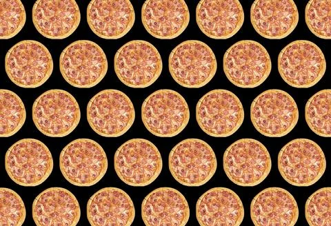 Trendy colorful repeating pattern of a whole pizza on a black background. Stock Photos