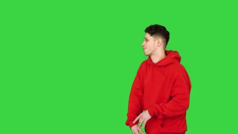 Trendy dancer man walking and dancing on a Green Screen, Chroma Key. Stock Footage 142934333