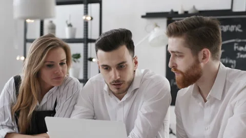 Trendy diverse partners startup development of job report on pc desktop screen a Stock Footage 199475557