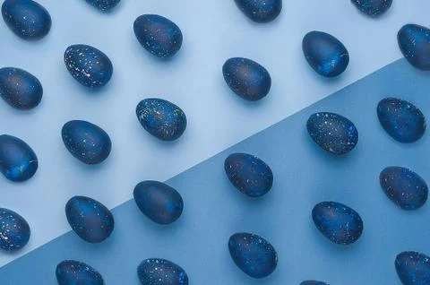 Trendy Easter egg pattern of color of the year-classic blue with gradient eff Stock Photos
