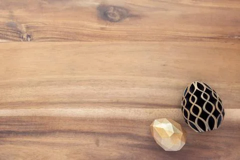 Trendy Easter low poly decor. Golden and black eggs of geometric style. Happy Stock Illustration