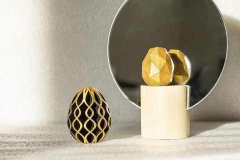 Trendy Easter low poly decor. Golden and black eggs of geometric style. Happy Stock Photos