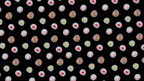 Trendy food animation or background of moving sushi maki rolls on black Stock Footage 221583085