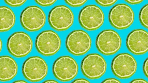 Trendy food fruit pattern of kiwi and lime halves Stock Footage 245696474