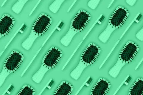 Trendy full mint colored pattern of eco wooden bamboo hairbrush and toothbrush Stock Photos