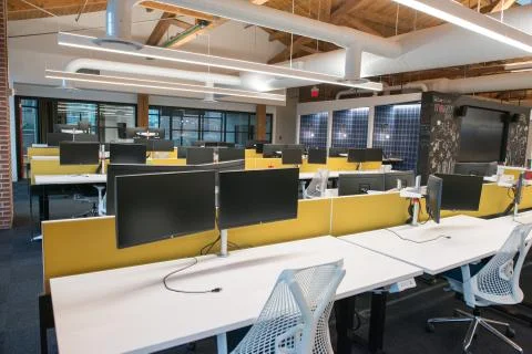 Trendy modern open concept loft office space with big windows, natural light and Stock Photos