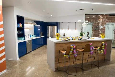 Trendy modern open concept loft office space with big windows, natural light and Stock Photos