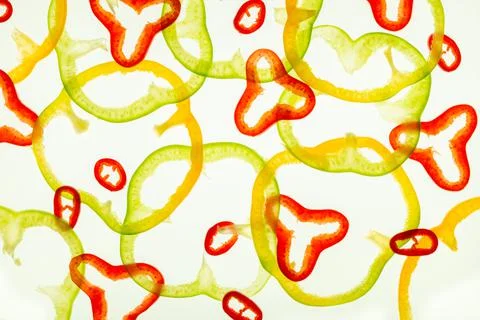 Trendy pattern of fresh mix pepper slices background 写真素材