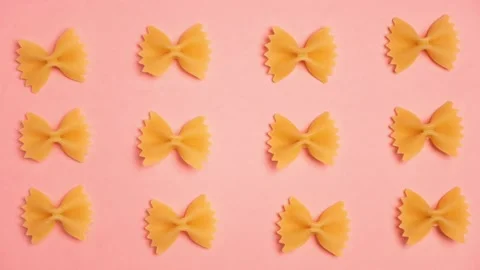 Trendy stop motion closeup moving yellow macaroni. Restaurant work concept. Stock Footage 161622024