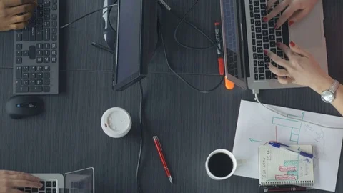 Trendy young workers checking the new business results Stock Footage 73847981