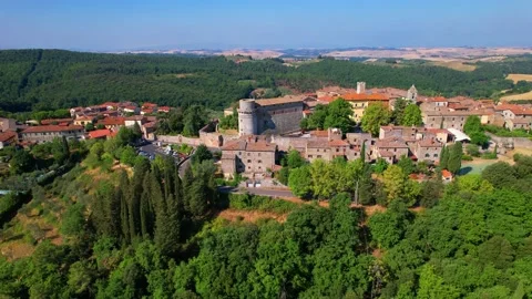 Trequanda Aerial drone orbit view 4k mediaval-Tuscany Italian town ancient wall 스톡 동영상 202591647
