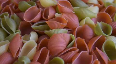 Tri-color pasta in rotating. Close Up. Stock Footage 64024360