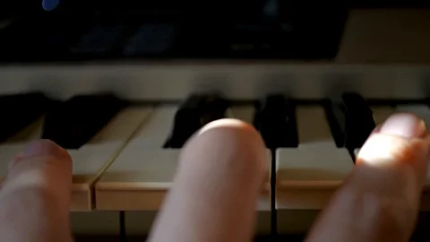 Triad played on a digital keyboard Stock Footage 127699958