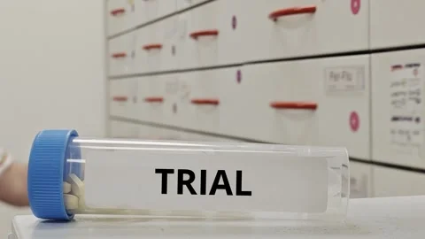 TRIAL oral tablet research development clinical trial and evidence concept box Stock Footage 347409638