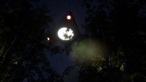 Trialgular UFO Over Trees Stock Footage