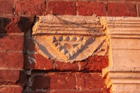 Triangle on the bas-relief. Stock Photos