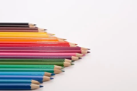 Triangle of colored pencils Stock Photos