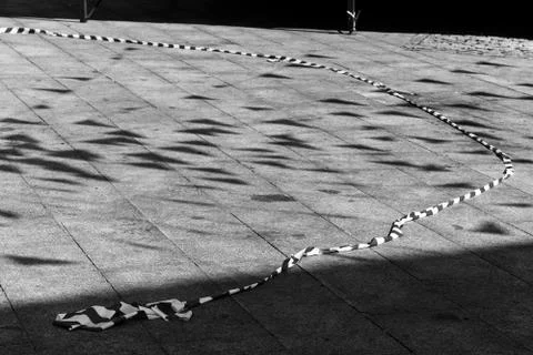 Triangle flags casting shadows on the ground Foto stock
