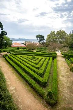 Triangle hedge garden with river view in Belem, Lisbon, Portugal Stock Photos