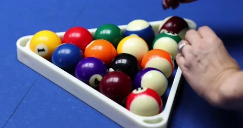 Triangle of multicolored billiard balls and female hand Stock Footage 238833658