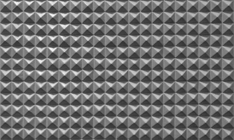 Triangle pyramid tiles pattern surface texture. Close-up of architecture inte Stock Photos
