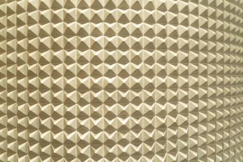 Triangle pyramid tiles pattern surface texture. Close-up of architecture inte Foto stock