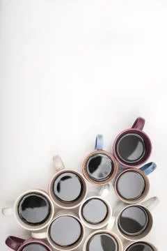 Triangle shape of coffee mugs isolated on white background with copy space Stock Photos