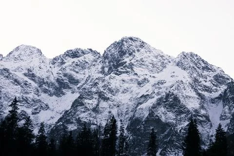 Triangle shaped snow cap mountain in the Polish Tatrah Stock Photos
