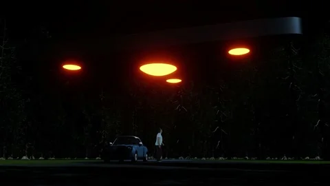Triangle UFO Alien Abduction from a car on a rural road forest Stock Footage 196542329