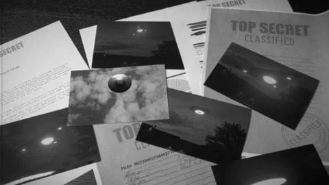 Triangle Ufo Evidence files on a table Stock Footage 156364259