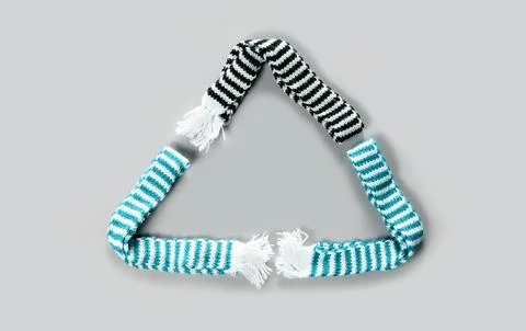 Triangle from warm scarves. Spring bad weather. Stock Photos