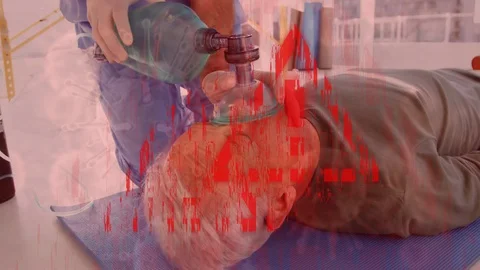 Triangle warning sign and Covid-19 spreading over a paramedic performing and a Stock Footage 128307140
