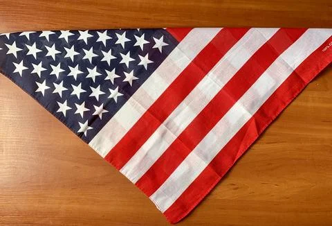A triangular American flag with vivid red and white stripes and a blue field of Stock Photos