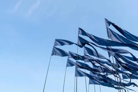 Triangular; banner against the blue sky. Triangular; banner against the bl... 스톡 사진