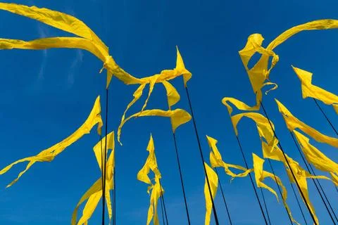 Triangular; banner against the blue sky. Triangular; banner against the bl... 스톡 사진