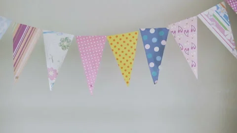 Triangular birthday flags. Festive garland decoration. Bright multi-colored tria Stock Footage 245352269