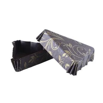 Triangular brown paper baking forms for cakes with golden pattern Stock Photos