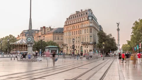 Triangular building and modern tram at Place de la Comedie timelapse, Bordeaux Stock Footage 299933156