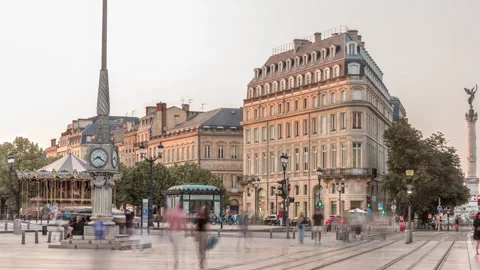 Triangular building and modern tram at Place de la Comedie timelapse, Bordeaux Stock Footage 306150032